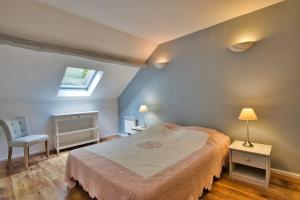 Maisons de vacances Grange authentique avec vue, piscine chauffee et Wifi : photos des chambres
