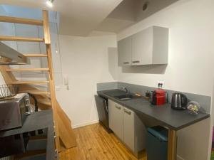 Appartements Le Ballainvillier - Appart calme en centre-ville : photos des chambres