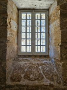 Appartements LA MAISON VALENTIN AU COEUR DE LA CITE MEDIEVALE : photos des chambres