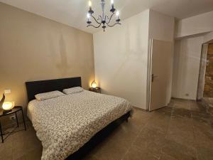 Appartements LA MAISON VALENTIN AU COEUR DE LA CITE MEDIEVALE : photos des chambres