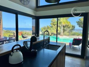 Villas Villa Milagathe - Vue sur mer - Piscine - Jacuzzi : photos des chambres