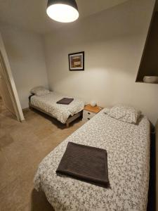 Appartements LA MAISON VALENTIN AU COEUR DE LA CITE MEDIEVALE : photos des chambres