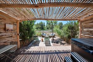 Hotels Le Hameau Des Pesquiers Ecolodge & Spa, Curio Collection By Hilton : photos des chambres