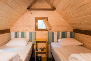 Campings les cabanes du tertre : photos des chambres