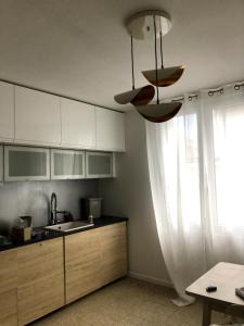 Appartements Maison des Doux : photos des chambres