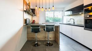Appartements Le Mimosa - Chic & Calme avec Piscine Dijon : photos des chambres