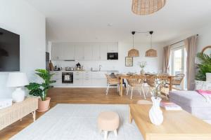 Bright Ground Floor Corner Home with Cozy Outdoor