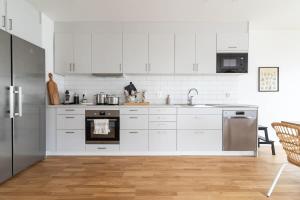 Bright Ground Floor Corner Home with Cozy Outdoor