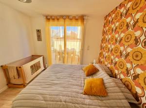 Sheila - RDC à la déco style années 70 avec terrasse à deux pas de la plage