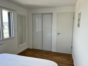 Appartements Appartement chic et lumineux - 100 m de la plage : photos des chambres