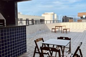 Lindo Flat a poucos passos da praia