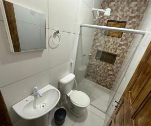 Casa Lateral em terreno de frente para o mar