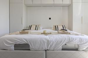 Maison 4 chambres entièrement rénovée, literie, terrasse & parking gratuit à Nieuwpoort-Stad by La Conciergerie