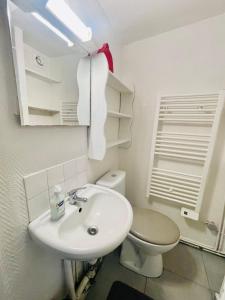 Maisons de vacances Charmante maison triplexe avec jardinet : photos des chambres