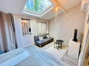 Maisons de vacances Charmante maison triplexe avec jardinet : photos des chambres