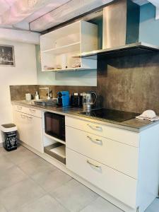 Maisons de vacances Charmante maison triplexe avec jardinet : photos des chambres