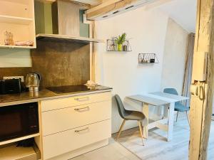 Maisons de vacances Charmante maison triplexe avec jardinet : photos des chambres