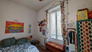 Appartements 70s Paris apartment : photos des chambres
