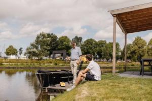 Watervilla buitenzijde met Sauna I 8 personen - Boutique Parc Pharshoeke