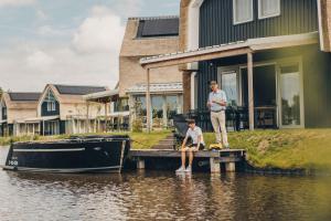 Watervilla buitenzijde met Sauna I 8 personen - Boutique Parc Pharshoeke