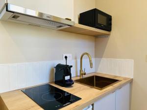 Appartements Le Petit Danton : photos des chambres