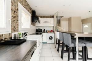 Maisons de vacances Cosy Hub : Confort pro garage proche transports : photos des chambres