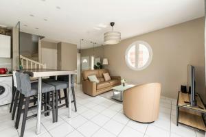 Maisons de vacances Cosy Hub : Confort pro garage proche transports : photos des chambres