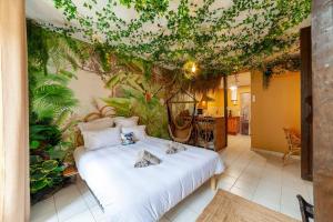 Appartements L-aventurier - Jacuzzi Lounge & Massage : photos des chambres