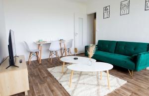Appartements L Echappee Bellini - Proche Paris - 15min Airport : photos des chambres
