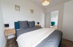 Appartements L Echappee Bellini - Proche Paris - 15min Airport : photos des chambres