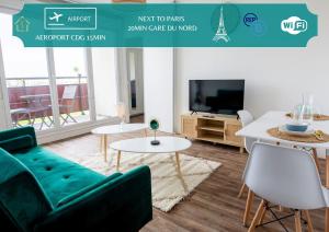 Appartements L Echappee Bellini - Proche Paris - 15min Airport : photos des chambres