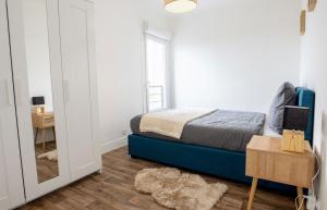 Appartements L Echappee Bellini - Proche Paris - 15min Airport : photos des chambres