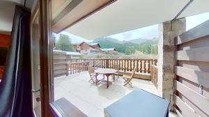 Appartements CASA-Amelie terrasse vue parking : photos des chambres