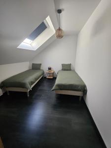 Appartements LES GITES DE TOURVILLE Bis : photos des chambres