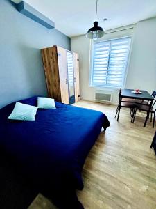 Appartements Studio Escale - Coeur de ville : photos des chambres