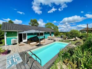 Maisons de vacances Villa 4 personnes piscine chauffee , Jacuzzi Normandie a la campagne : photos des chambres