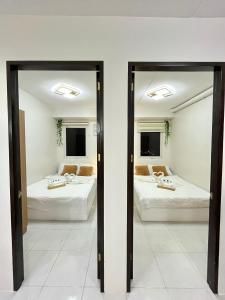 Cozy 2BR Stay for 6pax in High-Floor, Wi-Fi & Family Games near IT Park Cebu- Unit Scarlett by GERRA