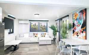 2 Bedroom PH Fully Renovated Beachfront Retreat with Private Patio & Breathtaking Ocean Views