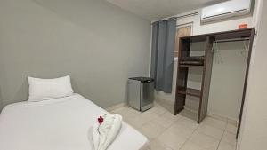 Hotel Balxibá alberca y estacionamiento