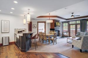 Exclusive Slopeside Luxury at Peak 8, Ski In-Ski Out with Hot Tub and Pools