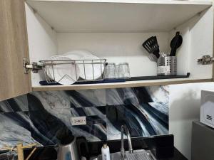 Entire 1 BR condo unit with balcony at MOA complex