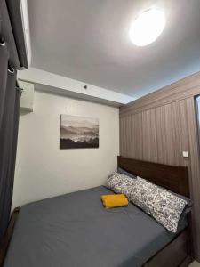 Entire 1 BR condo unit with balcony at MOA complex