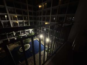Entire 1 BR condo unit with balcony at MOA complex