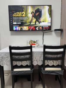 Entire 1 BR condo unit with balcony at MOA complex