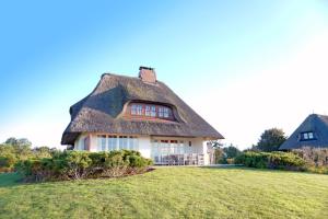 Reetdachhaus mit direktem Meerblick