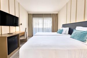 2 Twin Beds, Premium Lateral Ocean View, Non-Smoking room in Tryp Lisboa Caparica Mar