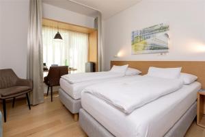 Standard Twin Room room in spinnerei designhotel linz
