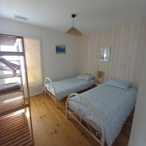 Maisons de vacances CASSY Maison 3 chambres avec jardin : photos des chambres