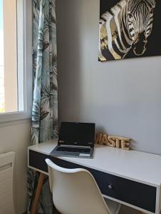 Maisons de vacances Gite climatise a 15 min de Lyon avec jardin prive : photos des chambres