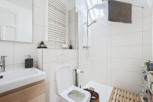 Appartements Cozy and bright apartment : photos des chambres